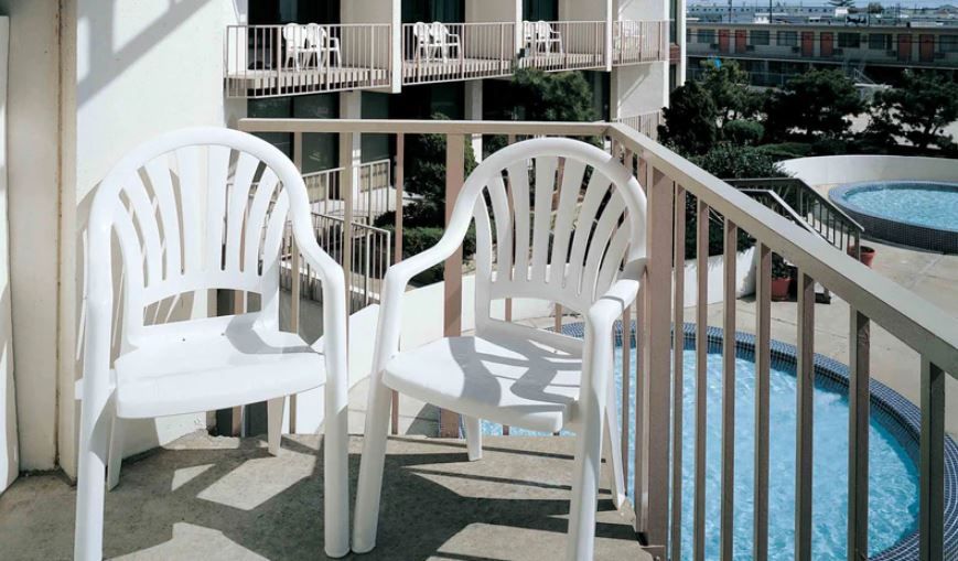 Pacific Fanback Stacking Armchair